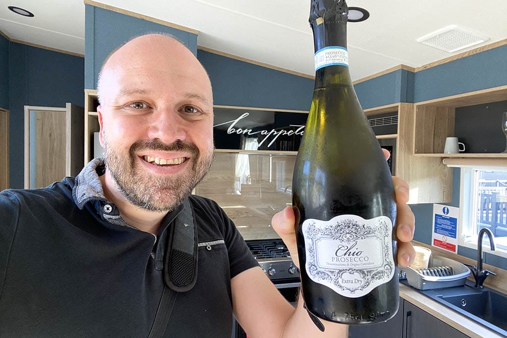 Appletree Holiday Park Prosecco Alex with prosecco at Appletree Holiday Park