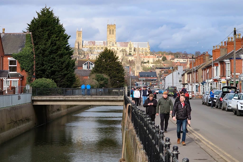 Sincil Bank Way Fans walking along Sincil Bank to LNER Stadium